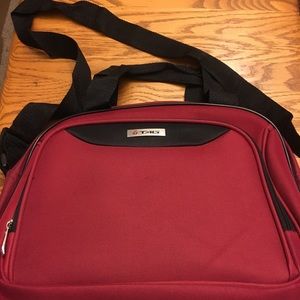 Burgundy/dusty red carry on bag, never used